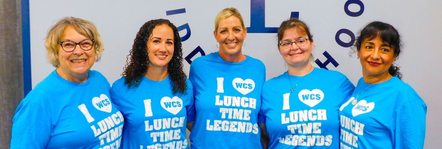Cafeteria Ladies in matching shirts